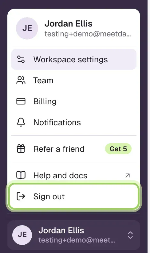 The account menu open above the user's name, with Sign out marked at the bottom.